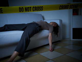 Crime Scene - Woman dead lying on the couch