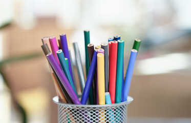 Set of colorful premium pencils for artist to create artworks. close up view. bunch of creative design pastel pencils.