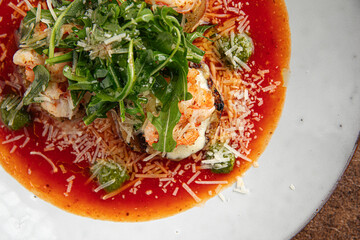 Closeup on gourmet grilled eggplant with shrimp and cheese