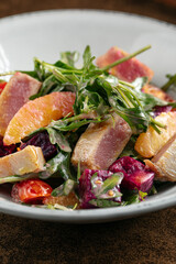 Closeup on gourmet salad with fried tuna and vegetables
