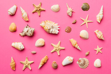 Summer time concept Flat lay composition with beautiful starfish and sea shells on colored table, top view - Powered by Adobe