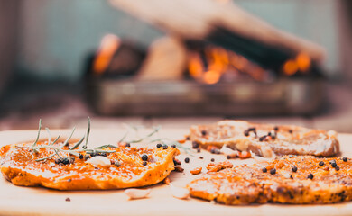 raw meat with herbs and rosemary ready for barbecue