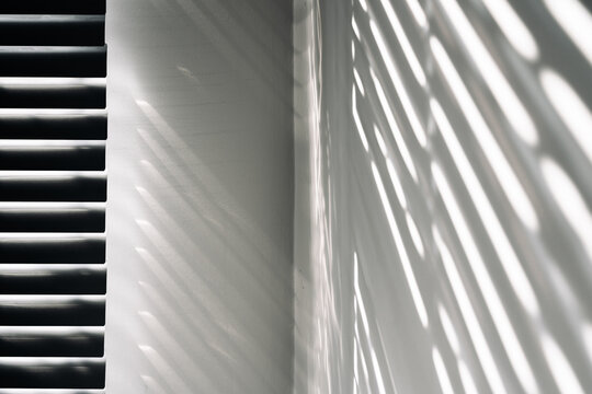 Space shadow. Sunlight architecture abstract background with light, black shadow overlay from window on white texture wall. Organic drop diagonal shadow for Decorative and backdrop.