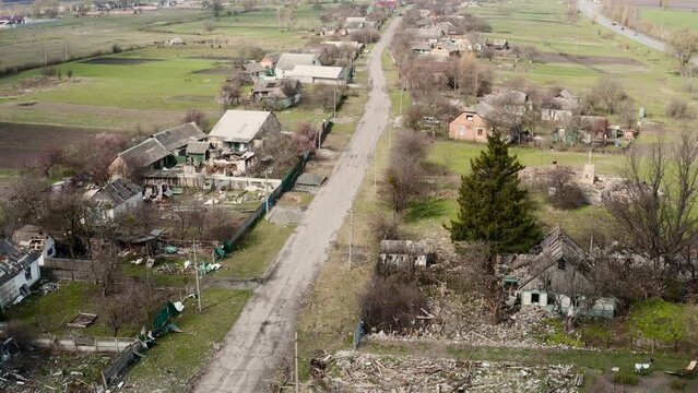 War in Ukraine, Shot and half-destroyed village Zagaltsi, village after the shelling, destroyed civilian houses, Kyiv region, aerial photography
