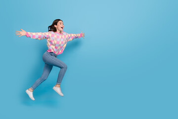 Full length profile side photo of young lady good mood glad runner open arms welcome isolated over blue color background