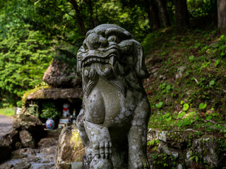 Fototapeta na wymiar 狛犬。日本の石像。