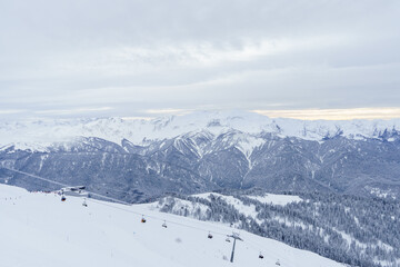 Winter mountain landscape: The Rosa Khutor Alpine Resort near Krasnaya Polyana panoramic background.