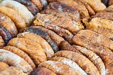 Organic dried figs close-up as vegetarian food background