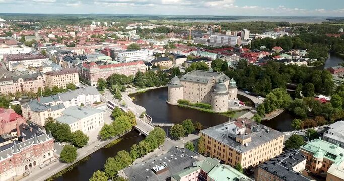 AERIAL view,  Flying over Orebro Castle in Sweden on Sunny Summer day.