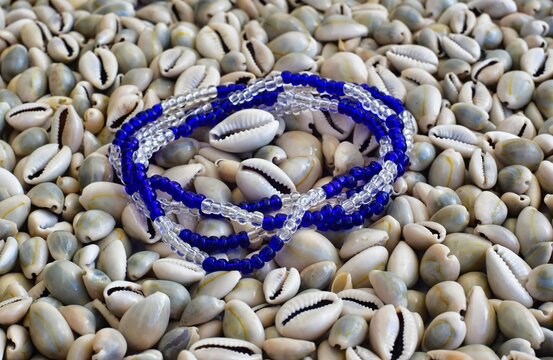 image of the representative necklace of the Orisha Yemaya and snails, Yoruba religion