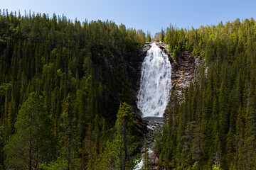 Big waterfall in summer setting