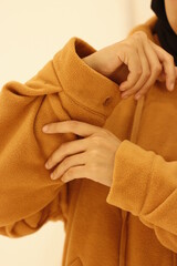 details of the thick yellow jacket