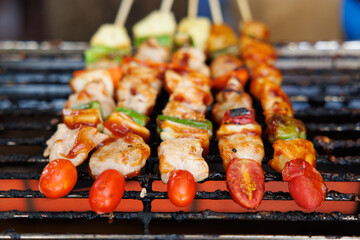 BBQ sticks on smokeless electric grill.