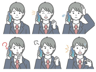 スマホで話すスーツの若い男性