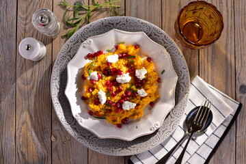 Pumpkin risotto with ricotta and pomegranate 