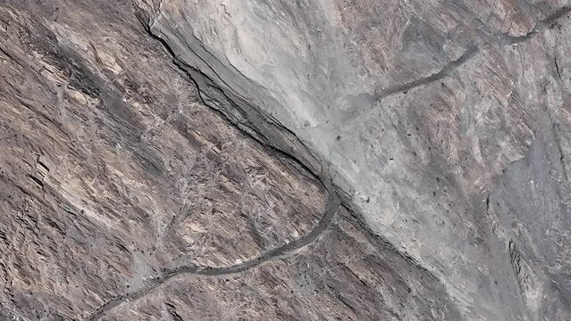 Old Silk Road Along The Karakoram Highway In Pakistan, The Section Of Visible Road High Up On The Cliff Side Evolved From Being A Foot Path