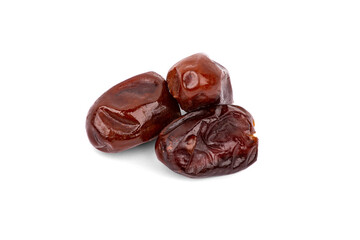 Dried fruits. Dates in close-up, isolated on a white background