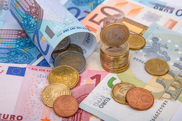 Background of euro, banknotes and coins close-up