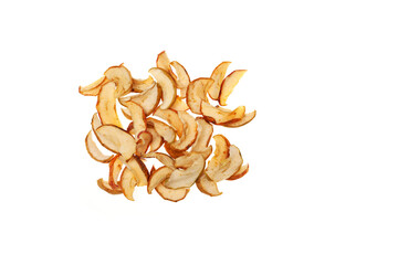 Dried apple slices or apple chips on white background. Healthy vegetarian snack. Dried fruits