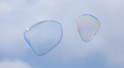 bubble blower on blue sky background