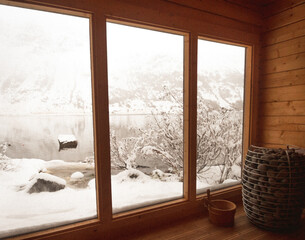 Sauna in the snow on a Lake in the Mountains in Lofoten norway