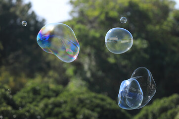 bubble blower on blue sky background