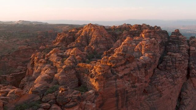 Tilting aerial shot showing the depth and character of Utah's ancient lava flow mountains.