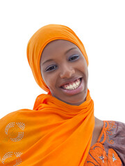 Beautiful young woman smiling and wearing an orange headscarf, 18 years old, face view,  isolated (cut out), white background, photo