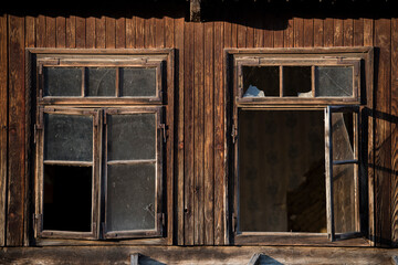 Croatia, May 01,2022 : Rustic style aged window at rural home wall.
