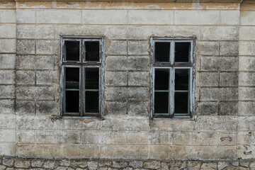 Fototapeta na wymiar Croatia, May 01,2022 : Rustic style aged window at rural home wall.