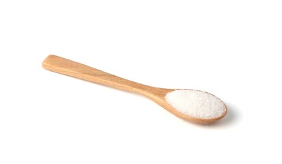 White sugar in wooden spoon isolated on white background