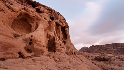 Fototapeta premium Rocky scenery in Wadi Rum desert during overcast morning