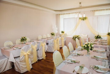 Wedding evening. Elegant and modern restaurant in classic style with wooden walls and big windows. Interior design restaurant