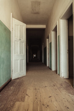 Inside destroyed buildings. Photo from the ghost town of Kolmanskop, nearby L&uuml;deritz, in the Namib desert. Namibia, Africa.