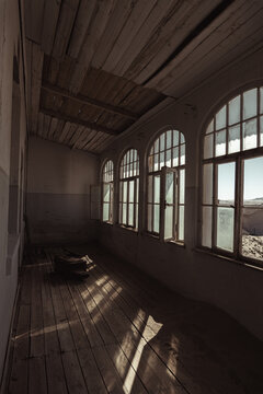 Inside destroyed buildings. Photo from the ghost town of Kolmanskop, nearby L&uuml;deritz, in the Namib desert. Namibia, Africa.