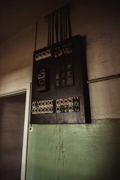 Old electrical panel. Photo from the ghost town of Kolmanskop, nearby L&uuml;deritz, in the Namib desert. Namibia, Africa.