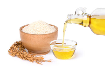 Rice bran oil extract with paddy and white rice on white background. 