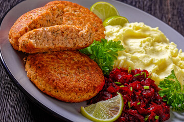 salmon patty with potato mash and beetroot salad