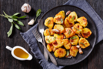 roasted squashed potatoes with garlic and sage