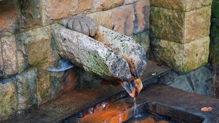 Water runs from this stone very slowly.