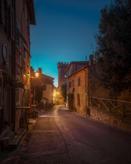 Bolgheri medieval village street at sunset. Castagneto Carducci, Tuscany, Italy
