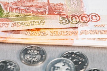 Top view russian rubles banknotes and coins.