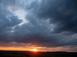 Fototapeta na wymiar Sunset in Germany in the sky clouds