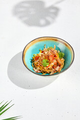 Stir fry noodles with chicken and bacon in asian style. Fried udon with meat and vegetables in...
