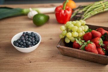 Fresh fruit lying all over the table