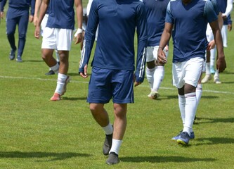 Fototapeta premium la sortie des joueurs de football à l'entrainement