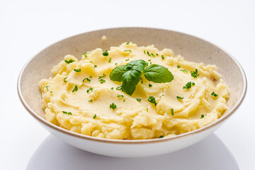 fresh tasty mashed potatoes on a white background