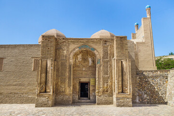 Facade of Magoki-Attari Mosque, most old building in Bukhara, Uzbekistan. Entrance to building is...