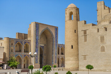Fototapeta na wymiar Panorama of the buildings of Ulugh Beg Madrasah and Abdulaziz-Khan Madrasah in Bukhara, Uzbekistan. Both buildings are listed by UNESCO
