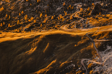 Autumn in the Italian Dolomites. The most beautiful time of the year to visit this place. Beautiful colors and breathtaking views. Mountain peaks above the valleys.